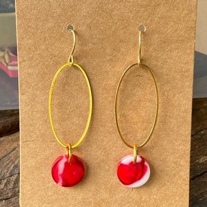 Red and white swirl dangle earrings on gold
